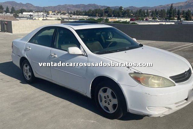 2002 Toyota Camry 4 puertas blanco carro usado de 2000 dolares